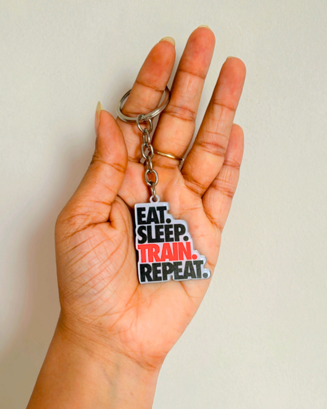 Eat Sleep Train Repeat- Key Chain