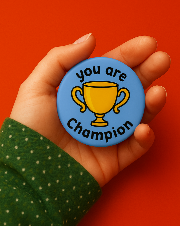 Champion- Badge Pin